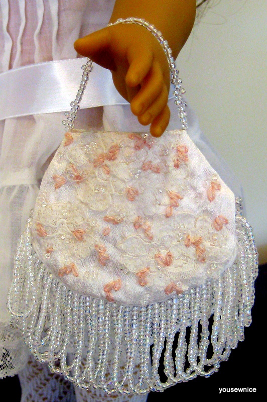 An embroidered and beaded silk purse for an American Girl doll