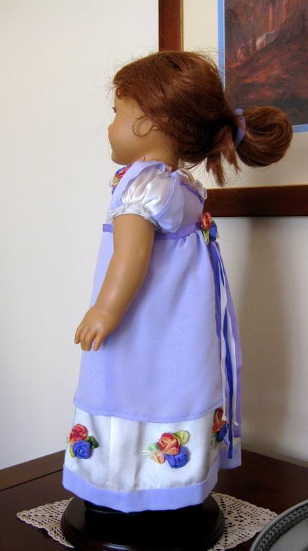 Side View of an American Girl Doll wearing a lavender silk regency ball gown