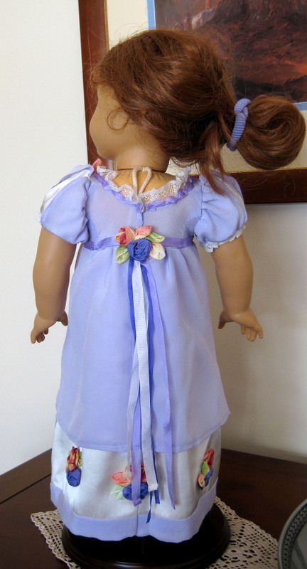 Back View of an American Girl Doll wearing a lavender silk regency ball gown