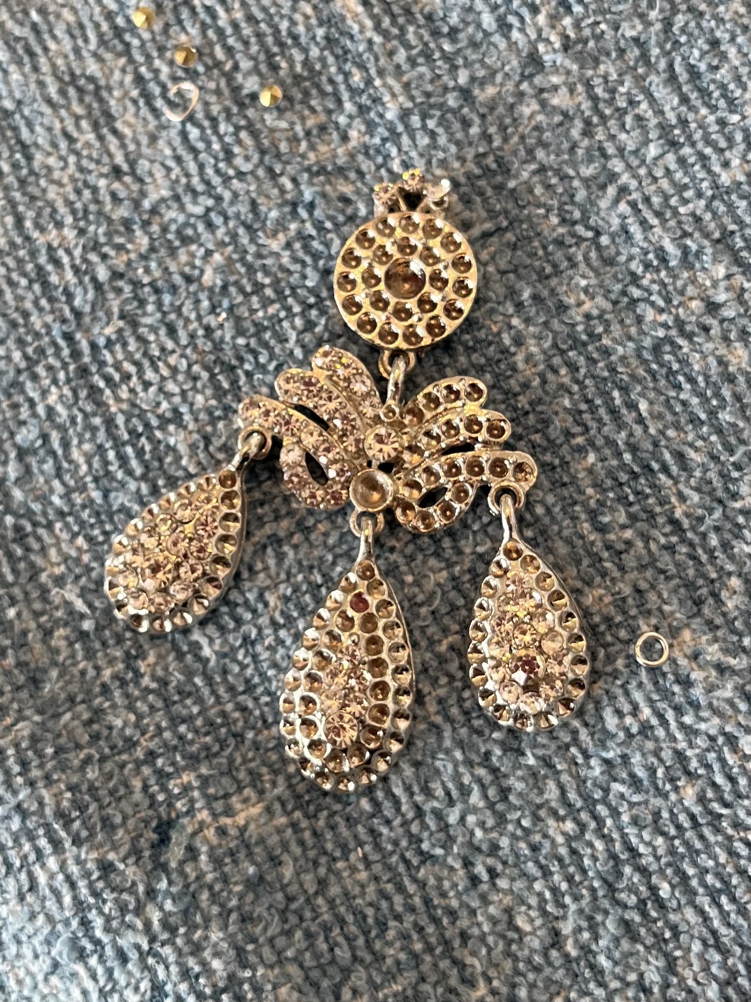 An 18th Century Girandole Earring with all of the rhinestones missing